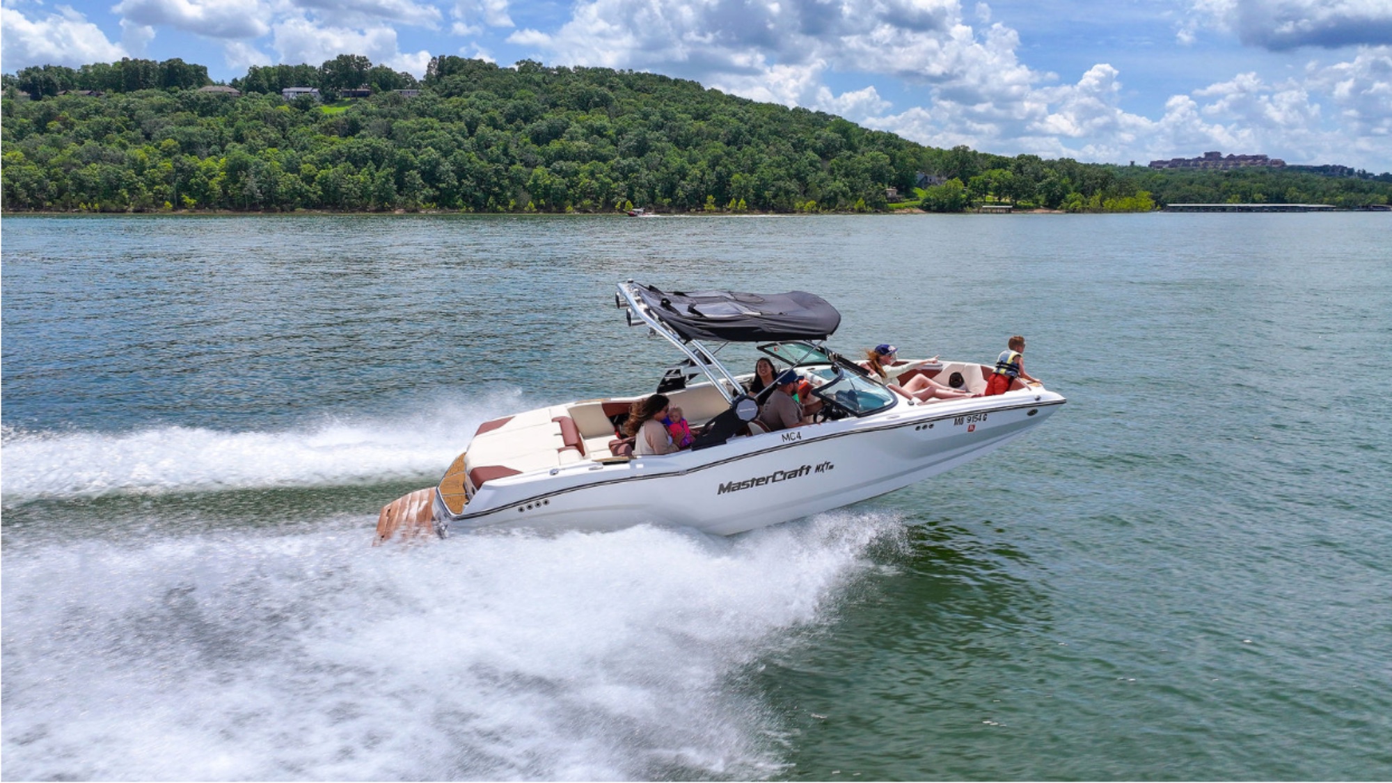 A MasterCraft NXT22 wake boat on Table Rock Lake