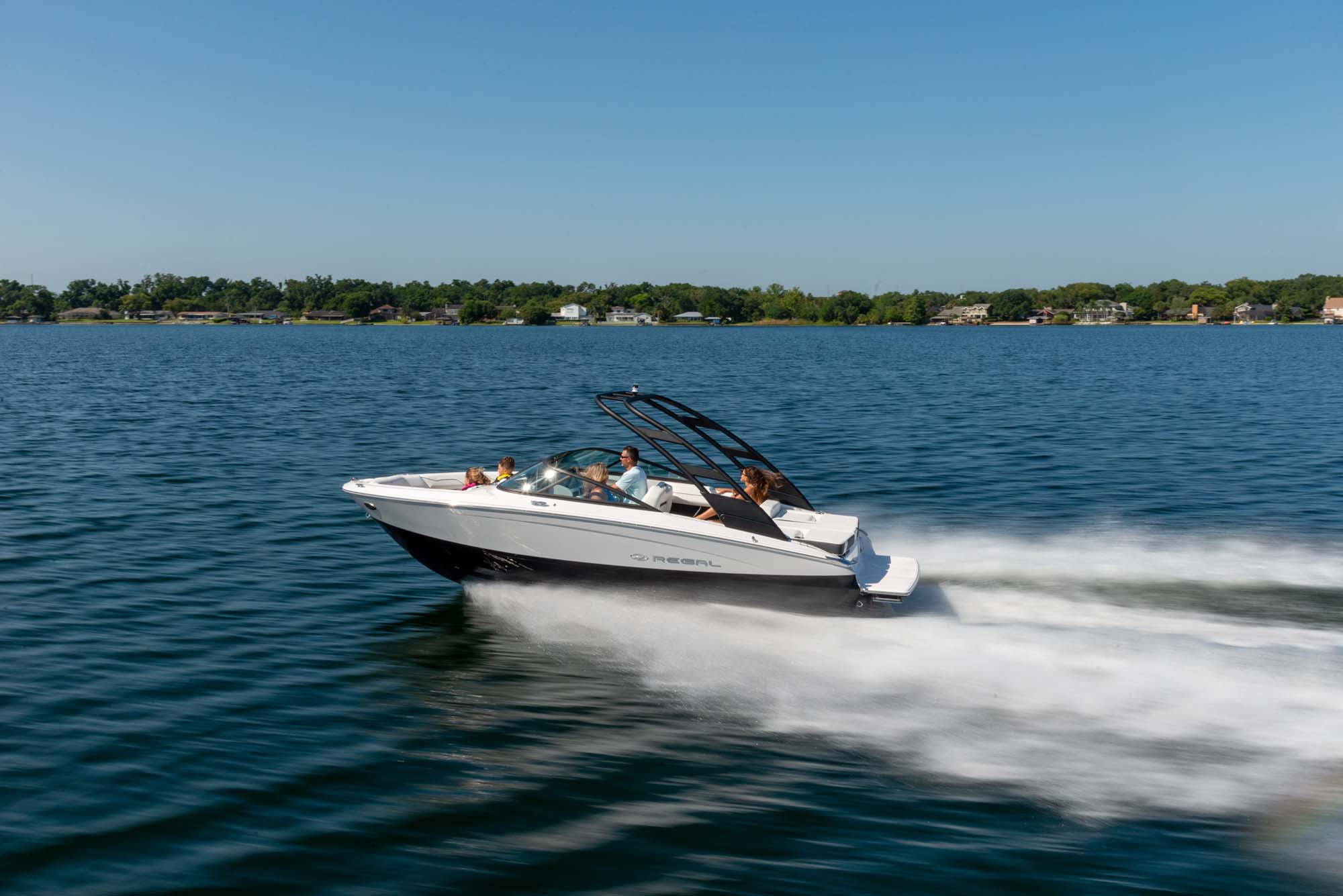 A Regal sport boat underway on the lake
